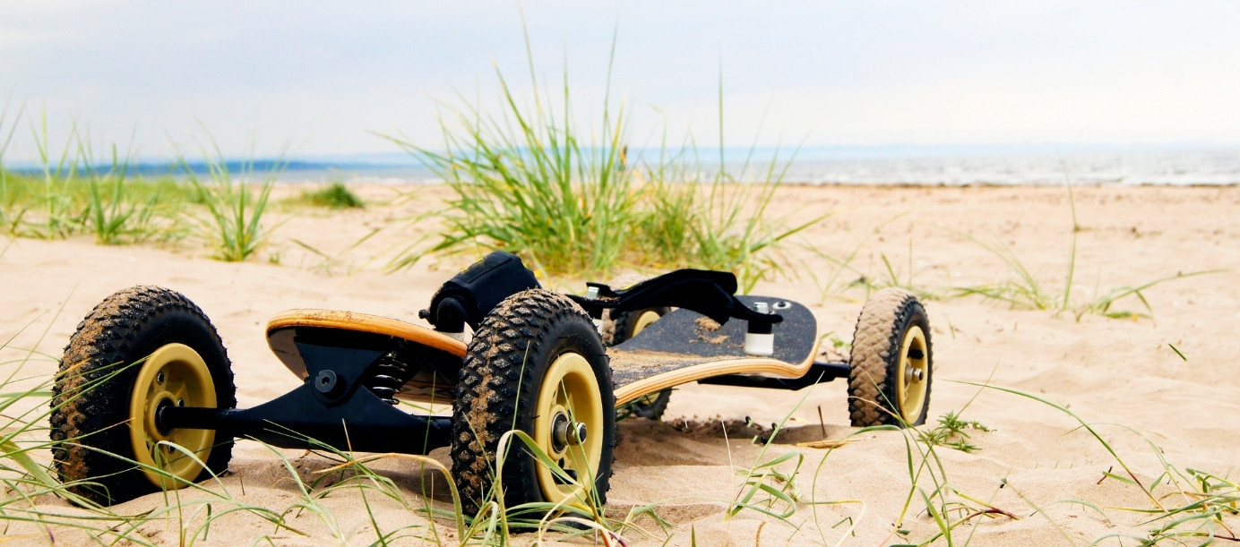 mountainboard sitting in sand