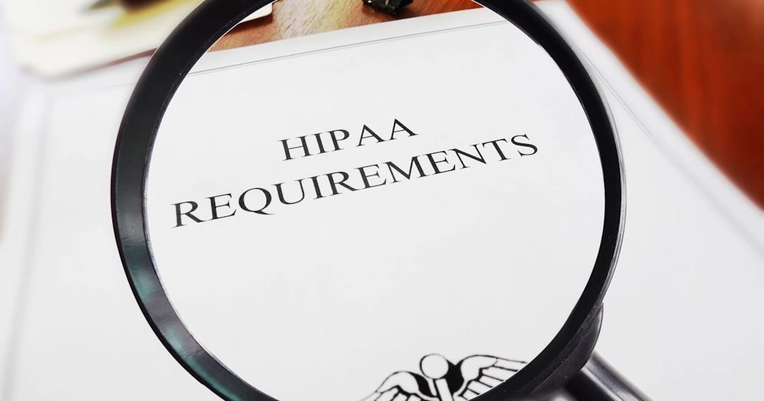magnifying glass looking at HIPAA requirements