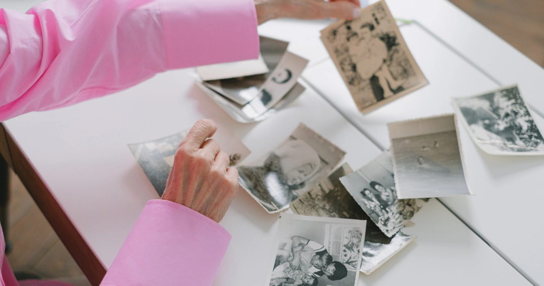 woman going through old photographs