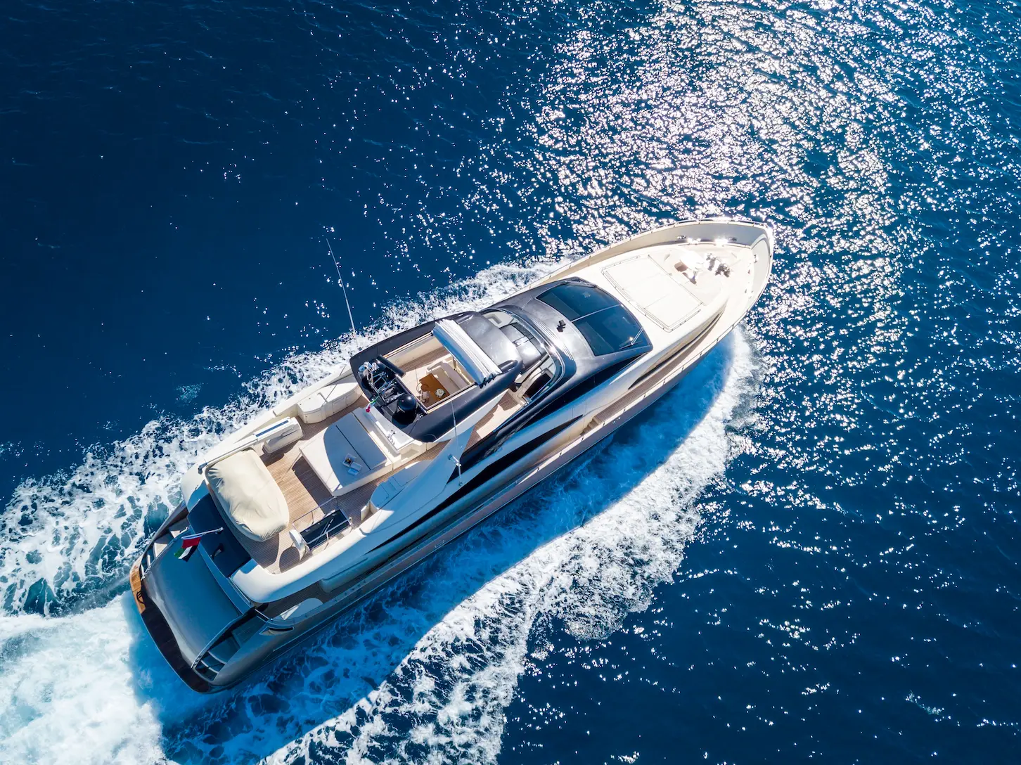 Aerial shot of a yacht sailing