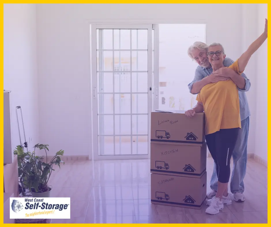 Retired couple with moving boxes Retired couple with moving boxes